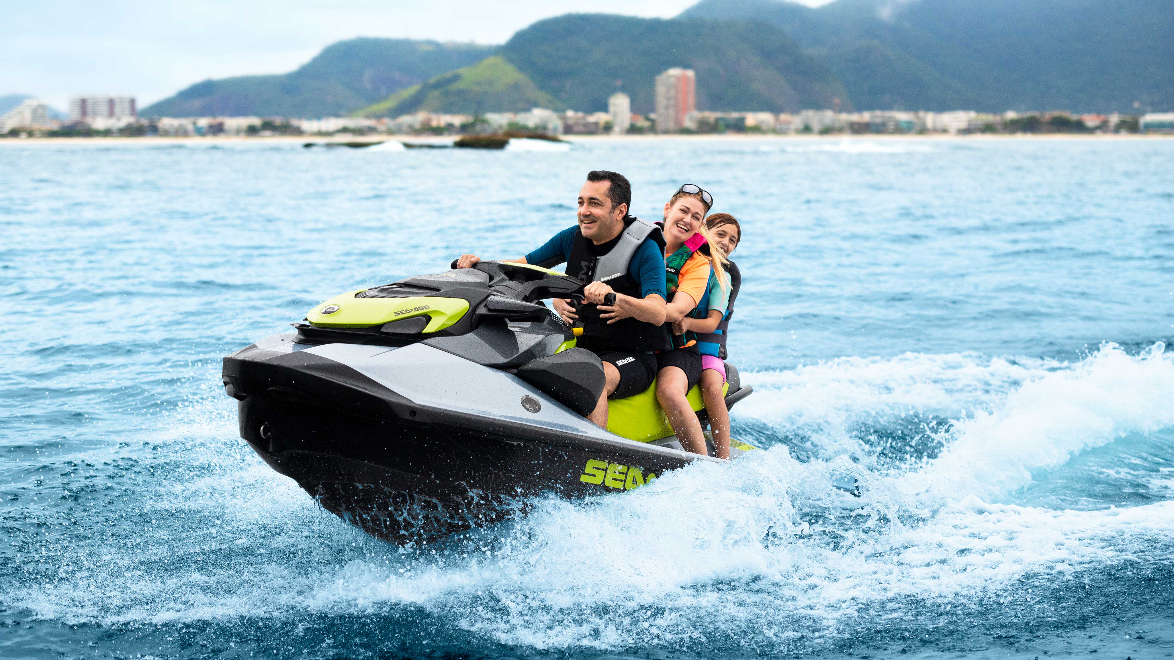 Family riding on a Sea-Doo GTI SE