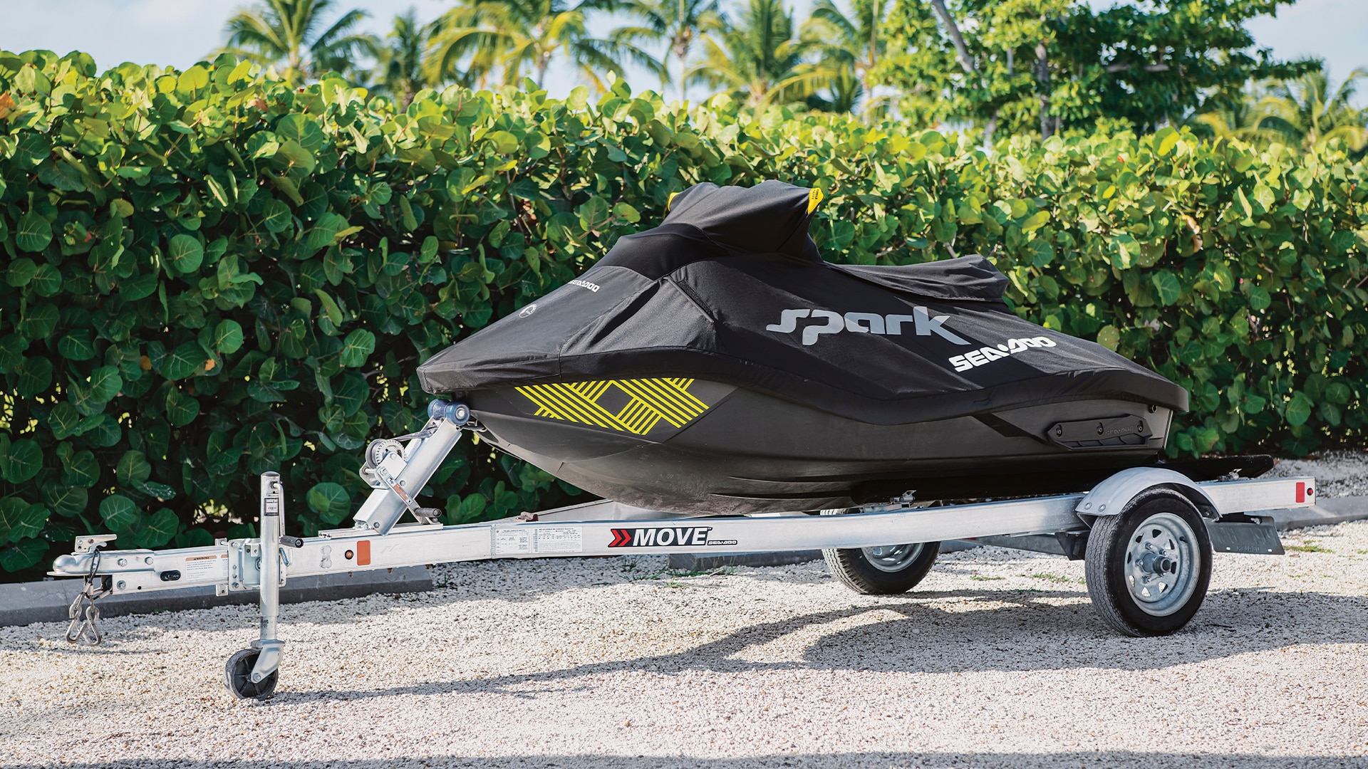 Covered Sea-Doo Spark personal watercraft on a MOVE trailer