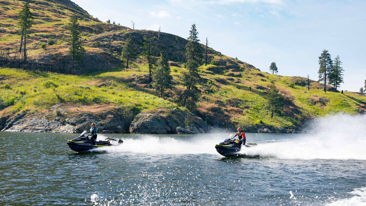 Two people riding the new Sea-Doo EXPLORER PRO