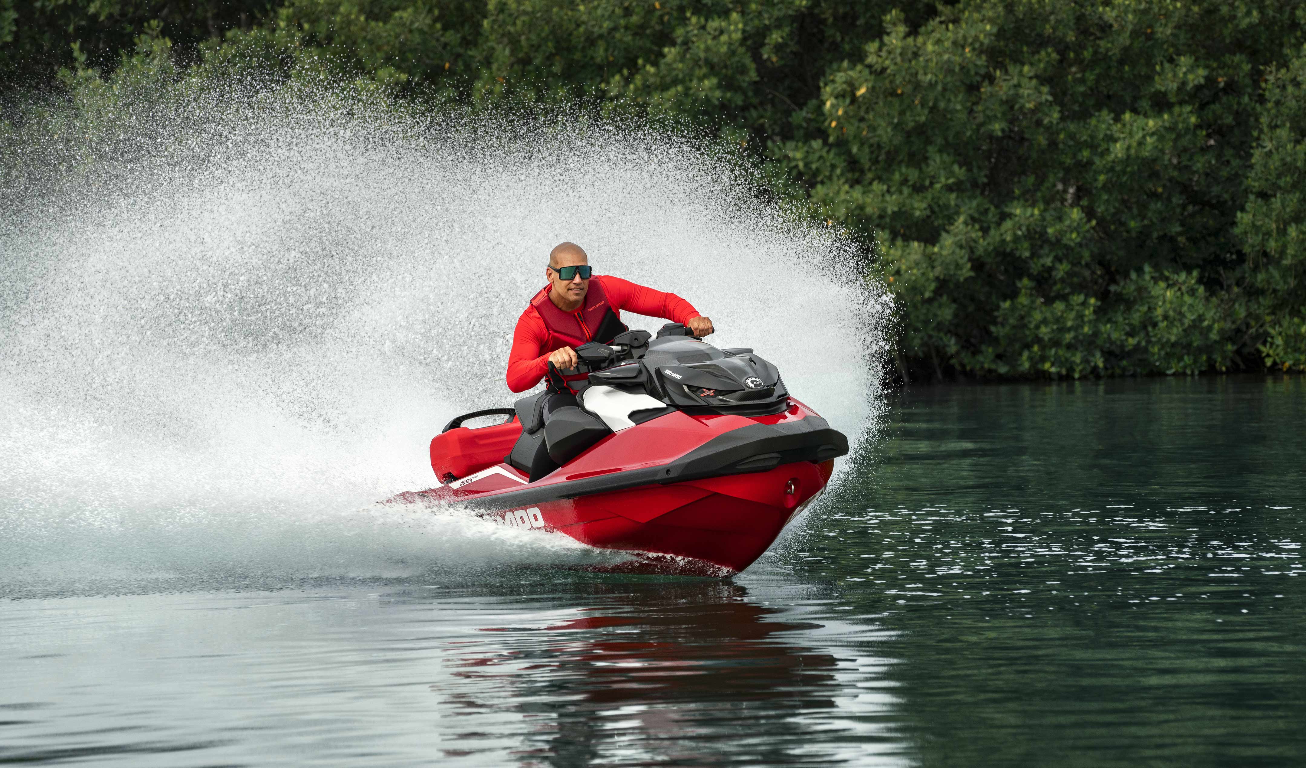 Rider driving a Sea-Doo RXP-X personal watercraft
