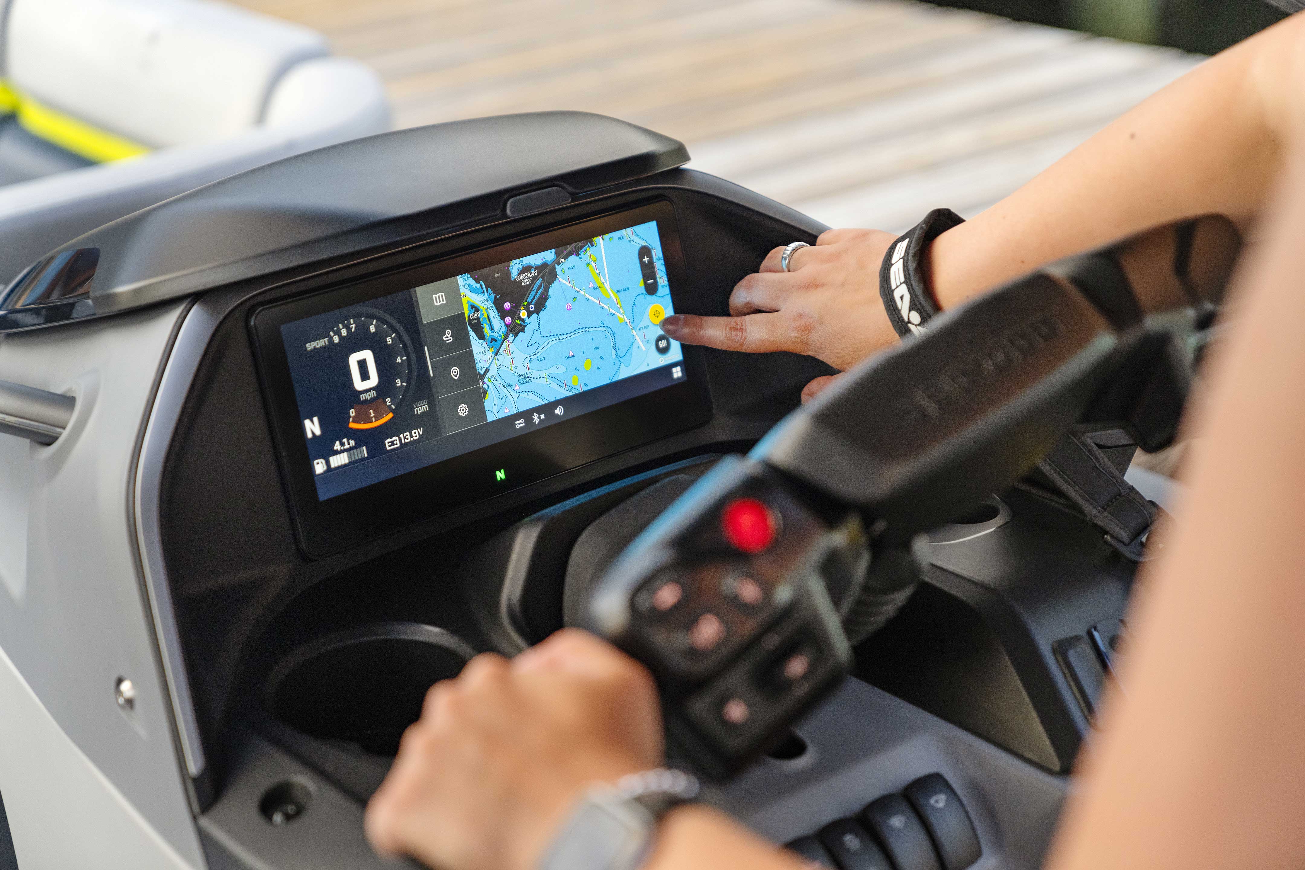Rider using the GPS functionality on the Sea-Doo Switch Limited touchscreen display