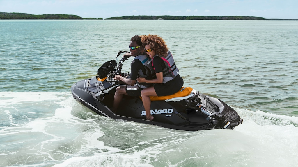 Couple riding a Sea-Doo Ppark with the Polytec Hull