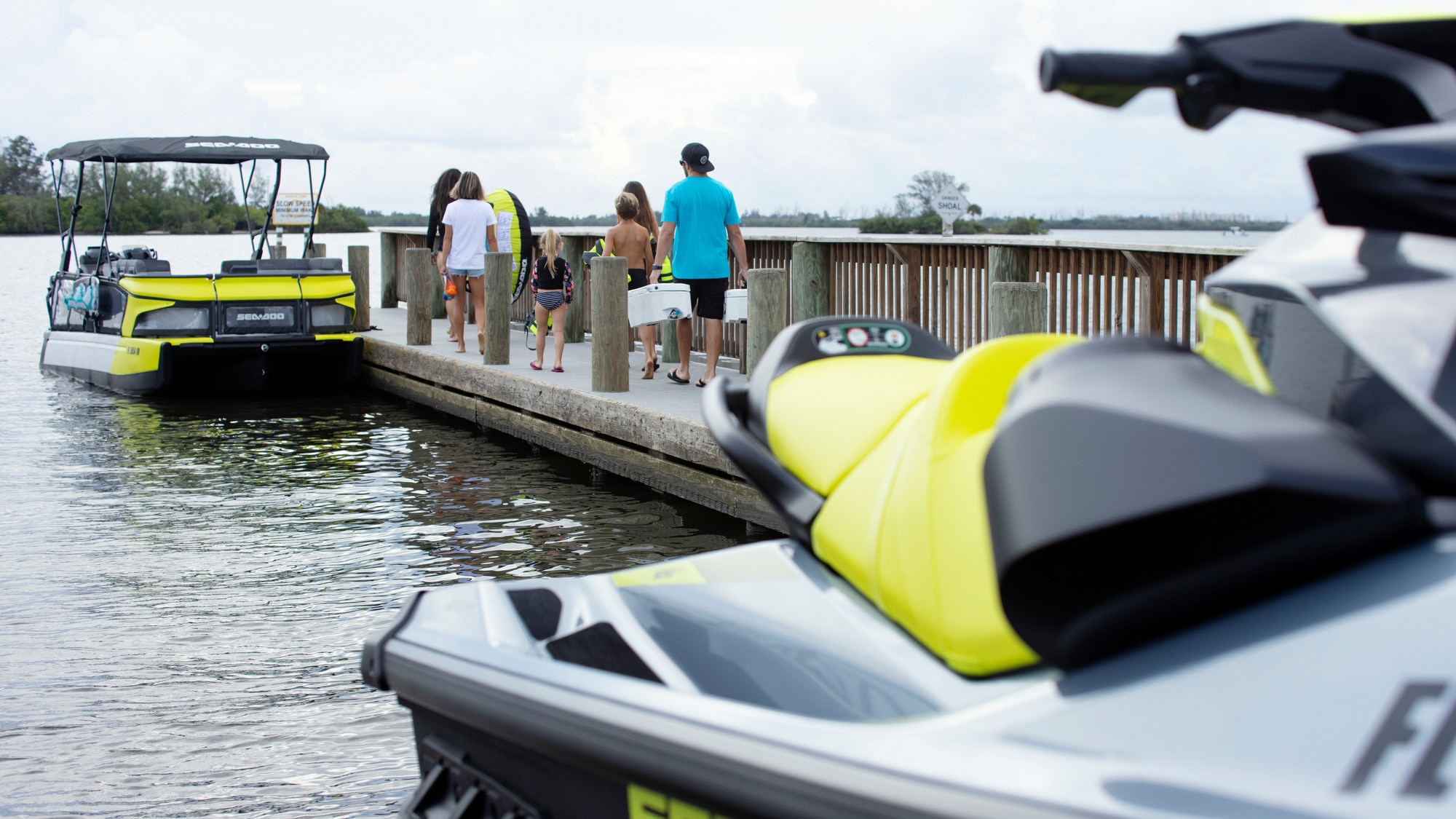 Family at the dock getting ready for a day on the water with their Sea-Doo
