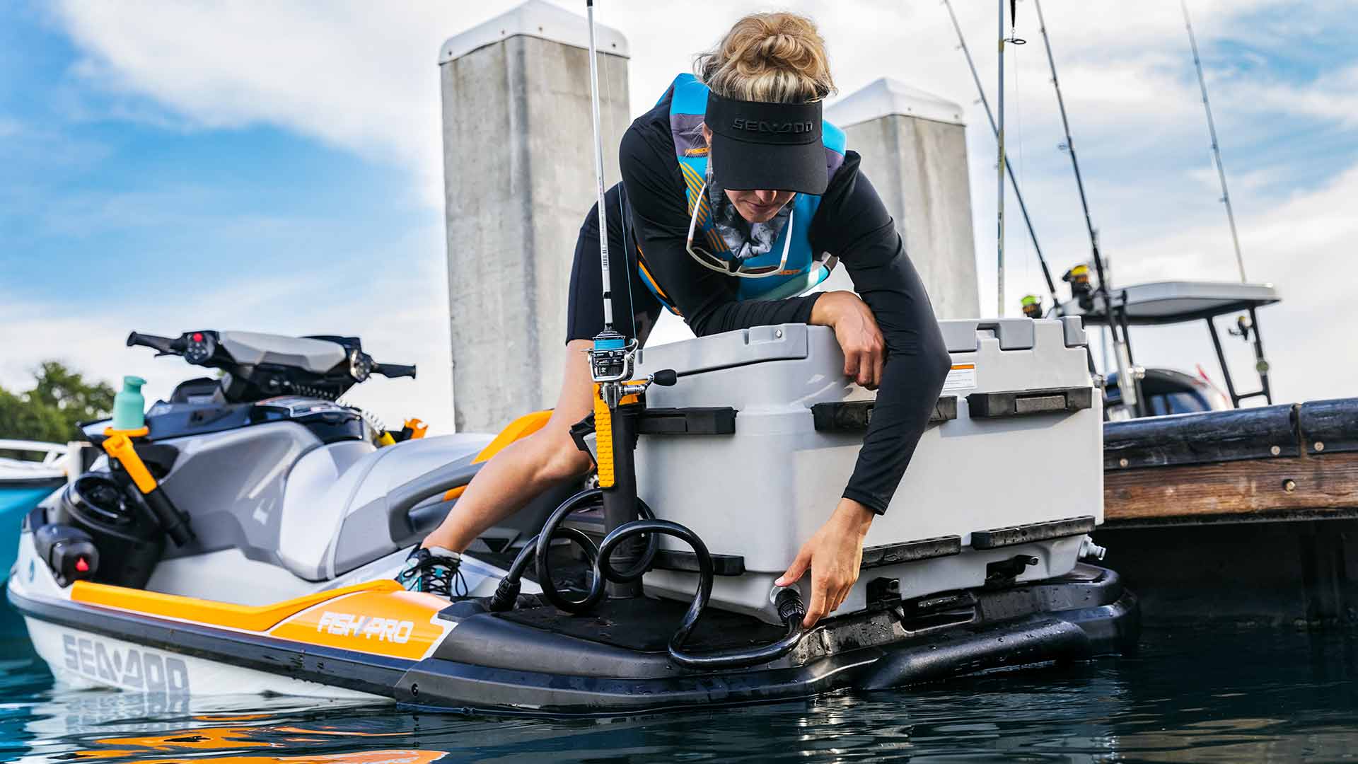 Woman using anchoring system on her Sea-Doo FishPro Trophy