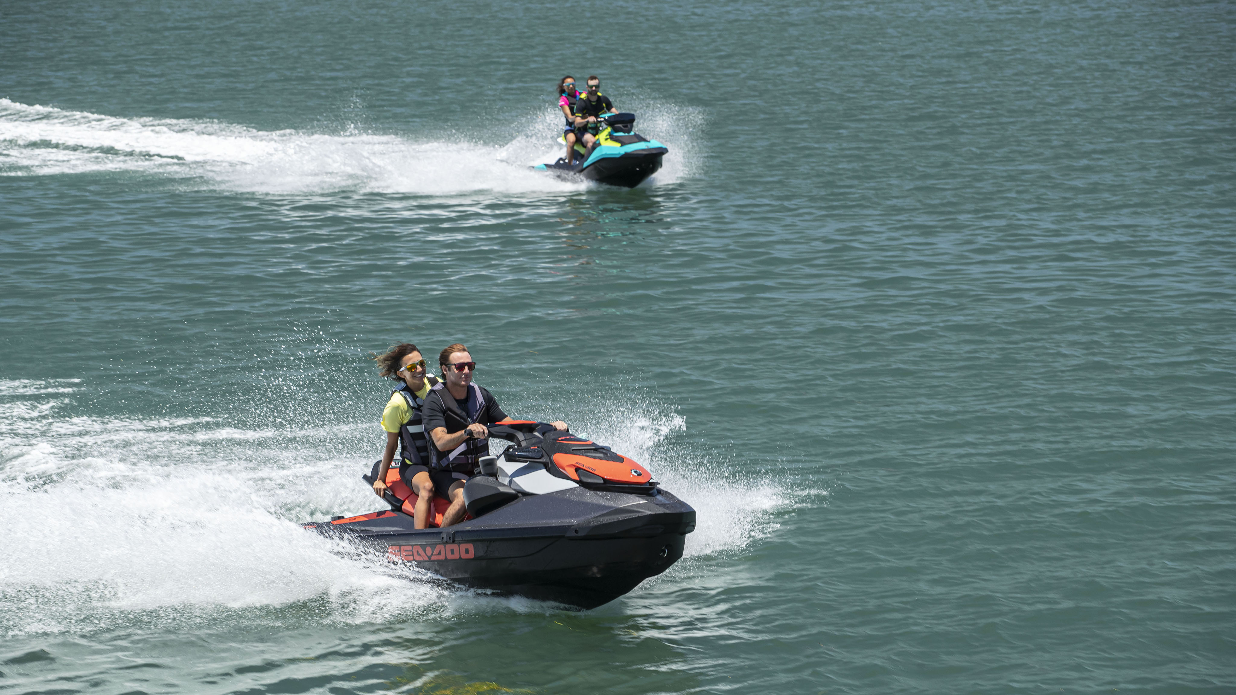 Two couples on riding their Sea-Doo GTI SE and Spark