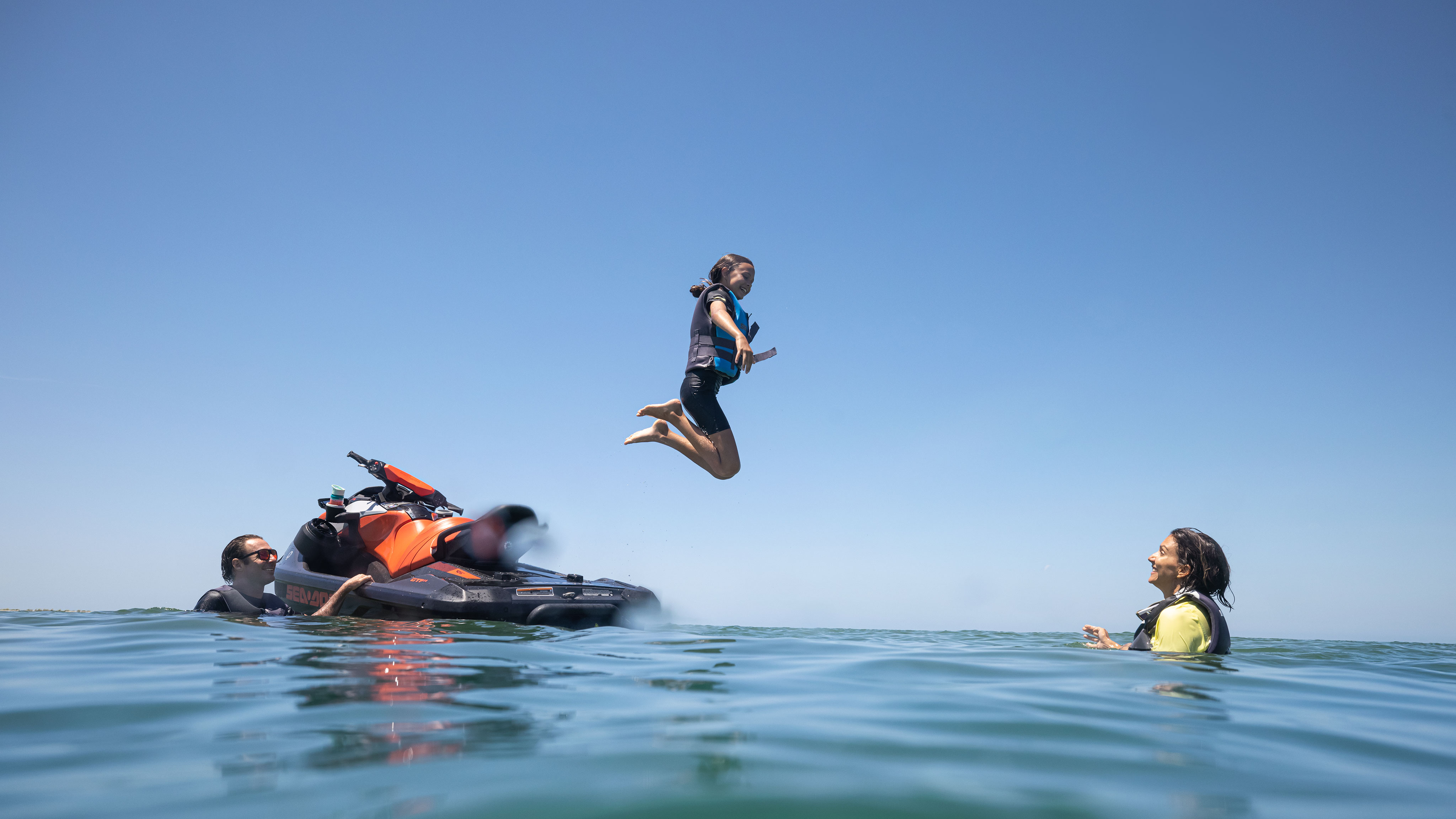 Kid jumping from a Sea-Doo