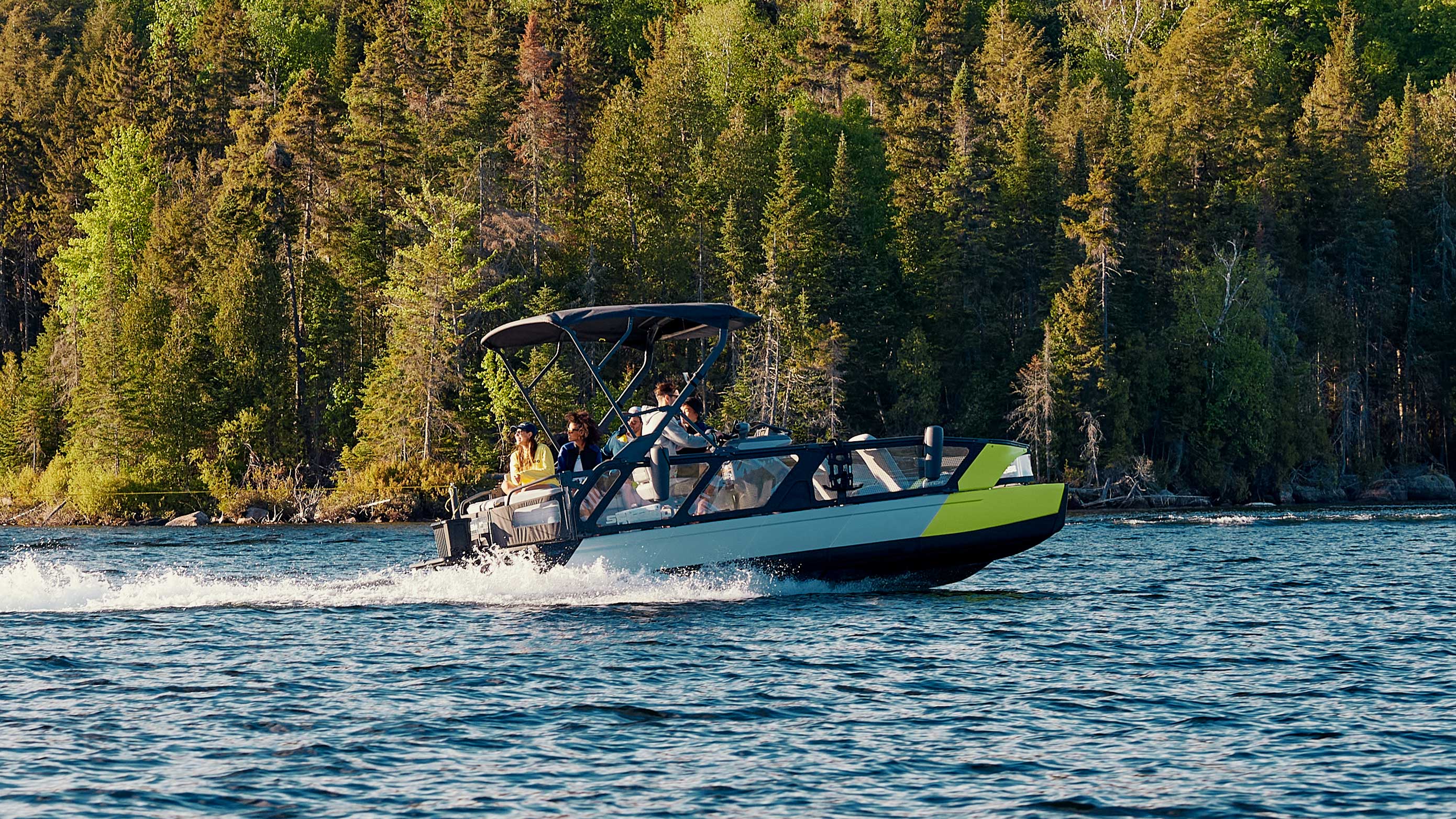 Group of friends doing tow sports with the Sea-Doo SWITCH SPORT pontoon